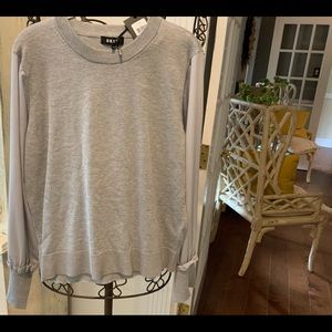 Cotton crew neck sweater with silk sleeves